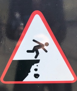 Image of someone falling off a cliff.