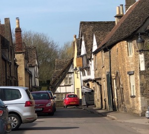 Image of small two-way road in Lacock, England