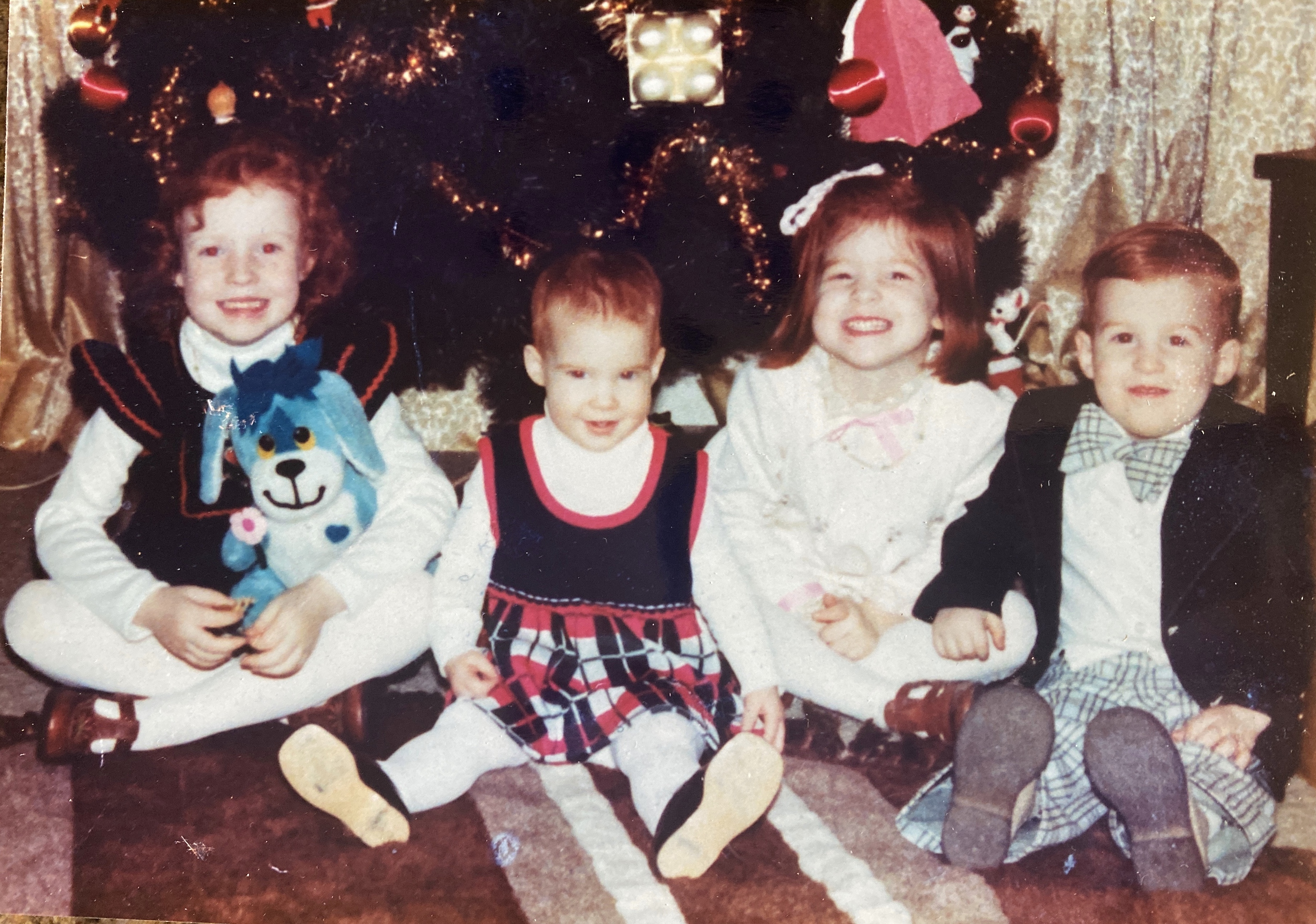 Image of four redhead children.